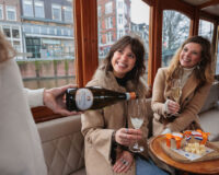 Enjoy a glass of Bubbles during a Flagship Amsterdam canal cruise