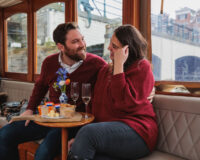 Young couple enjoying their Flagship Amsterdam canal cruise