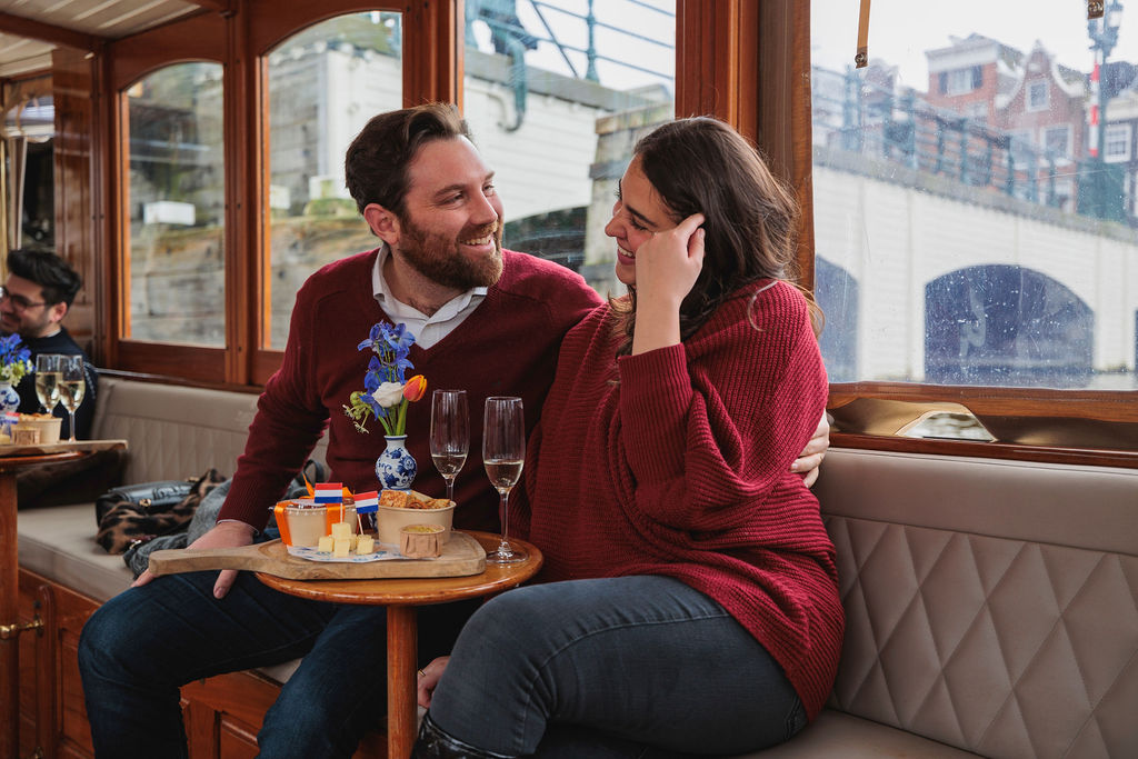 Young couple enjoying their Flagship Amsterdam canal cruise